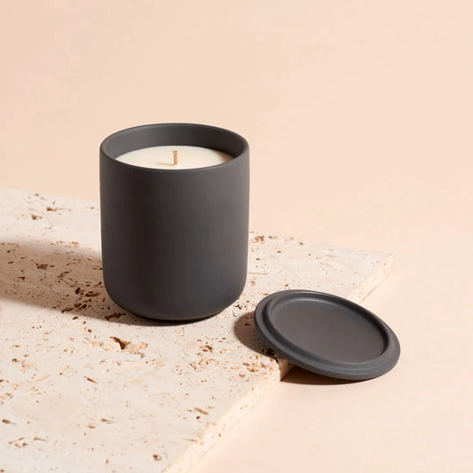 Candle in a black ceramic vessle by Lit By drew, in sage and seasalt scent for a relaxed aroma and a luxury home fragrance