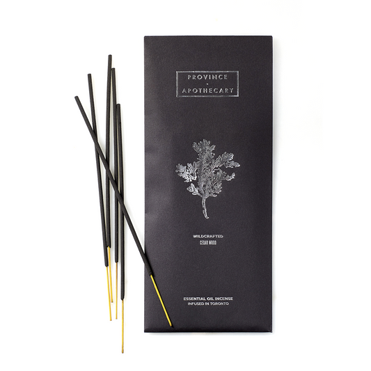 A set of incense sticks infused with essential oils by Province Apothecary, with the black packaging, in cedarwood scent.