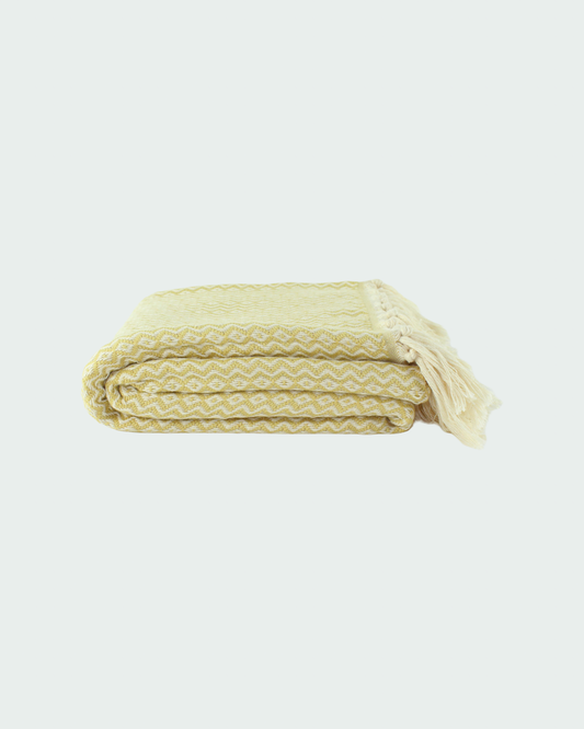 Turkish cotton peshtemal, thin beach towels in diamond design, in white and light yellow color.